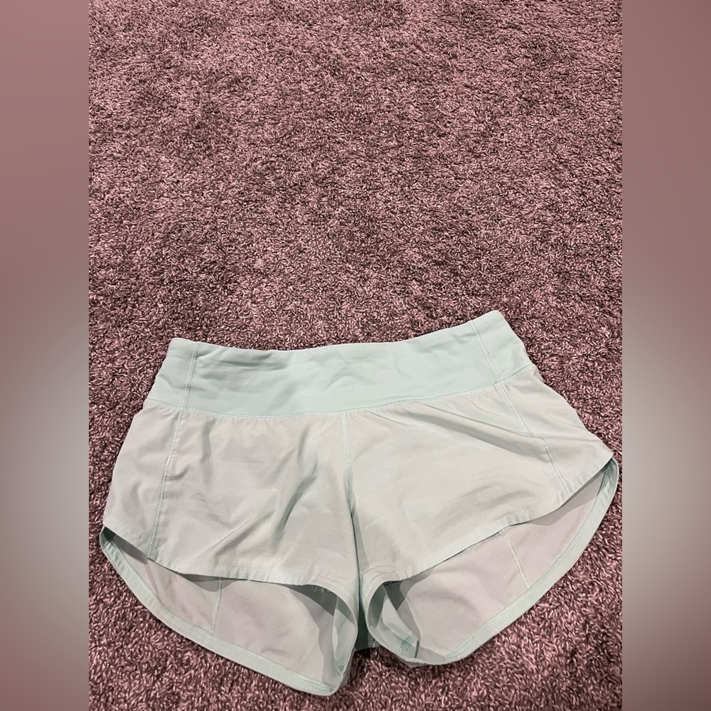 Lululemon teal speed it ups size 4